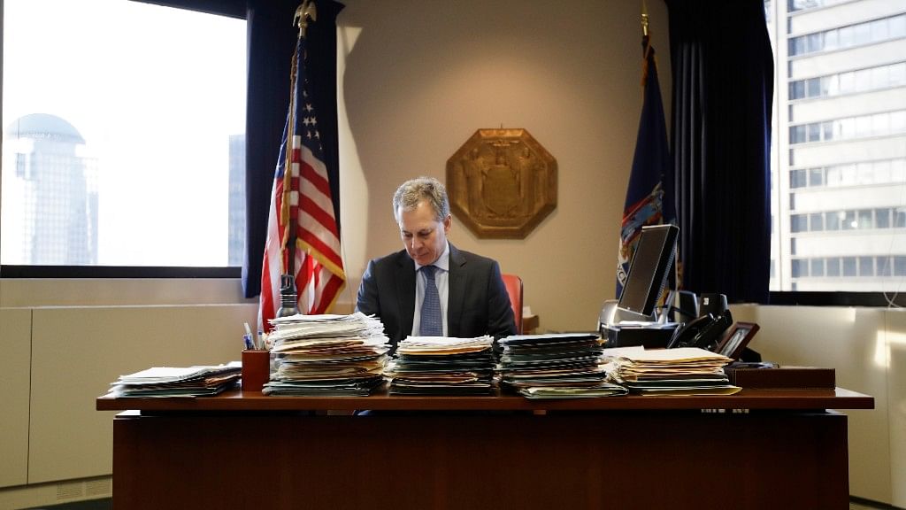  New York State Attorney General Eric Schneiderman sits at his desk in his office in New York.