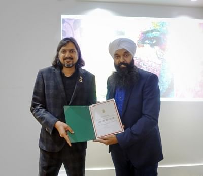 Ricky Kej Awarded Certificate of Appreciation by The Parliament - House of Commons, Canada. Presenting it is Mr. Randeep Sarai, Member of Parliament.