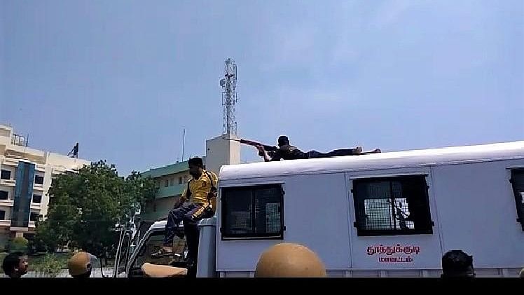 A video taken during the Sterlite protests shows at least two policemen were seen getting on top of a van and taking aim at protesters to shoot them down.