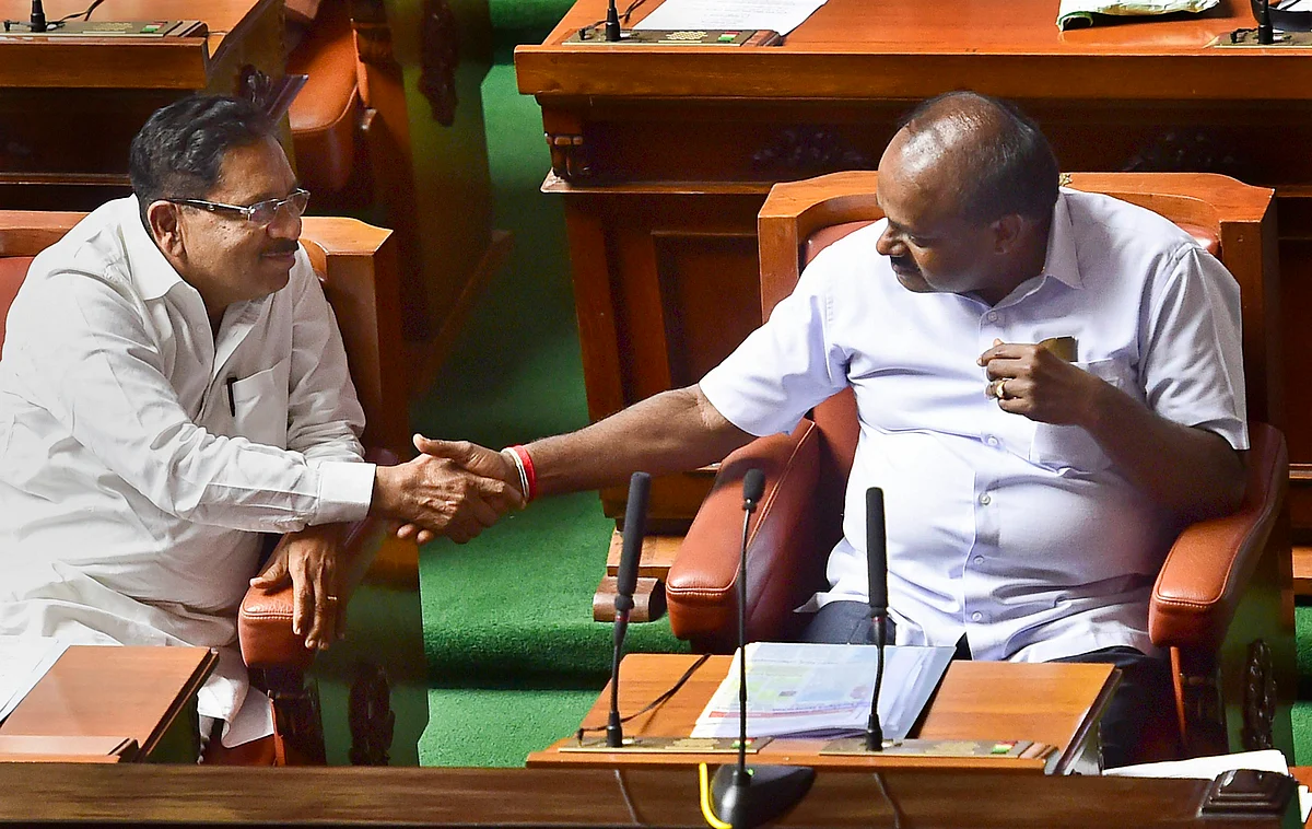 Karnataka Chief Minister HD Kumaraswamy (R) and his deputy G Parameshwara (L).
