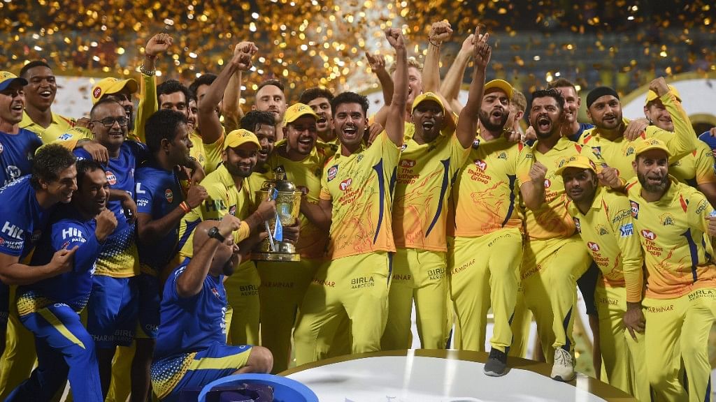  Chennai Super Kings players celebrate with the IPL 2018 trophy after winning the final match against Sunrisers Hyderabad, in Mumbai.&nbsp;