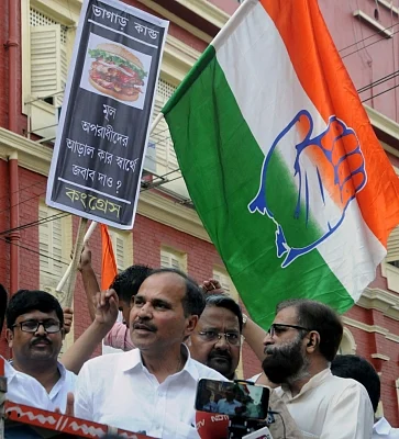 Kolkata: Congress workers led by Adhir Ranjan Chowdhury stage a demonstration after a racket of rotten meat suppliers was busted, in Kolkata on May 4, 20128. (Photo: IANS)