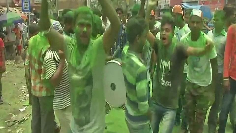 TMC workers celebrate during panchayat polls result.