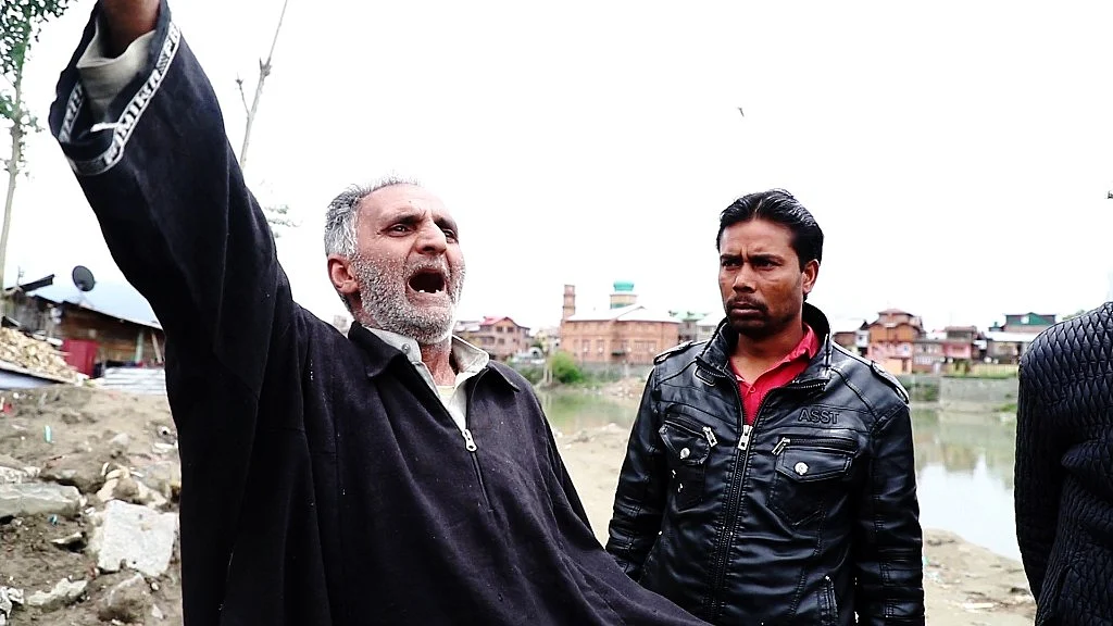 Adil’s father is in a state of shock after his son’d death. 
