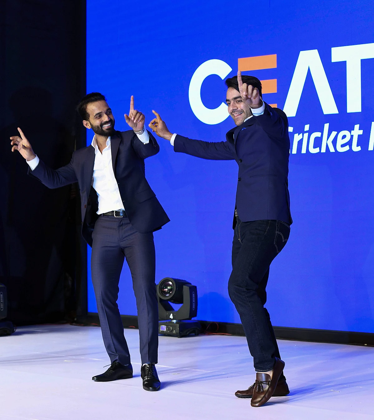 Ajinkya Rahane and Rashid Khan dance during the CEAT Cricket Rating Award felicitations, in Mumbai.