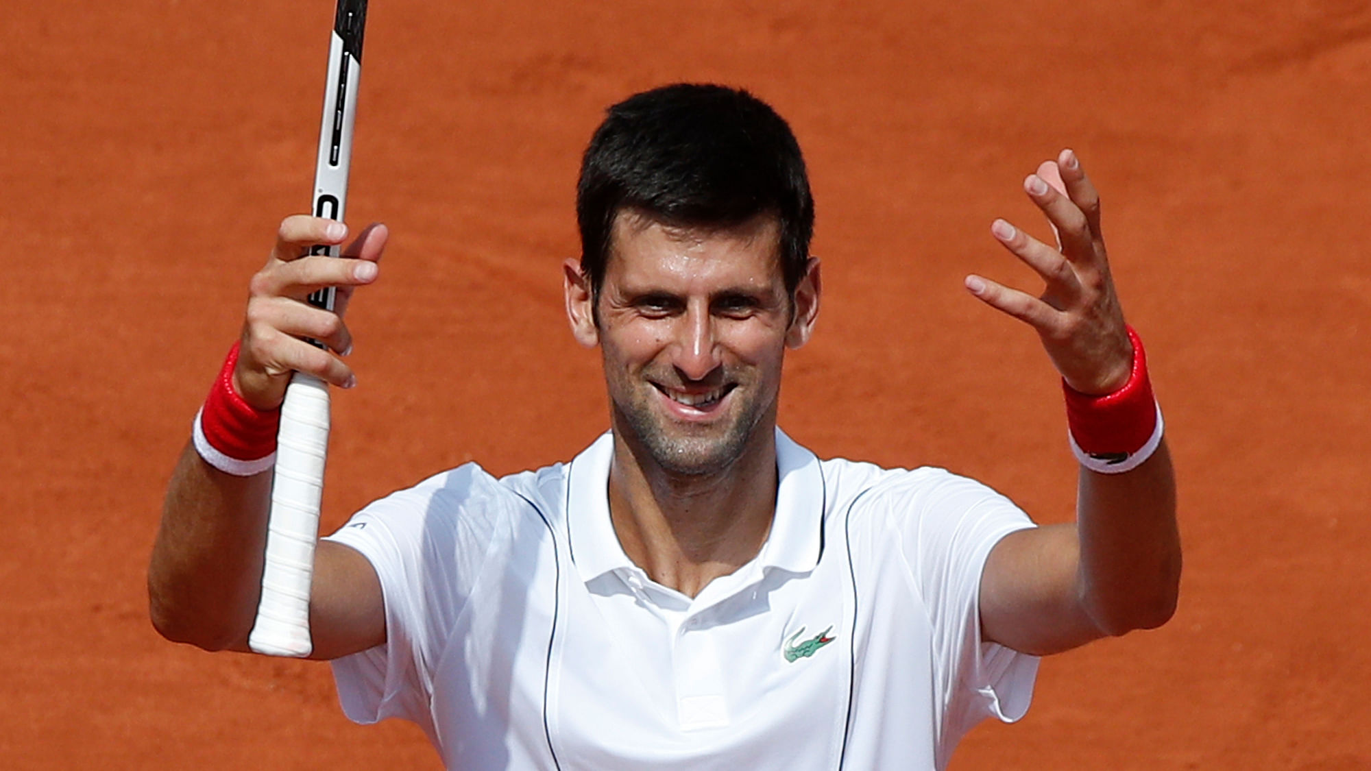 Serbia’s Novak Djokovic celebrates winning his second round match of the French Open.