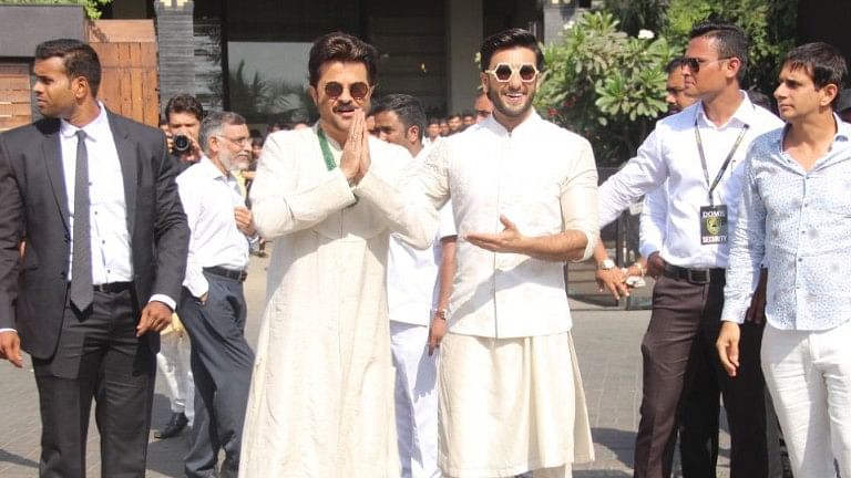 Anil Kapoor and Ranveer Singh greet the media at Sonam Kapoor’s wedding.&nbsp;