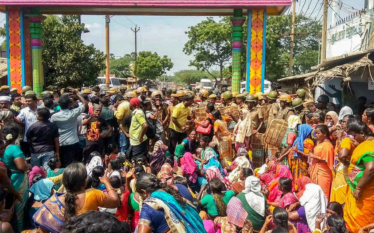 Police personnel tackle the agitators demanding the closure of Vedantas Sterlite Copper unit in Thoothukudi, Tamil Nadu, as the protest enters the 100th day.