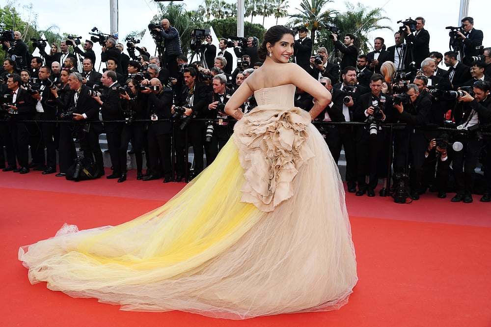Cannes 2018 In Pics Sonam Kapoor Turns Heads On The Cannes Red Carpet Her hair, tied into a neat bun, beautifully.