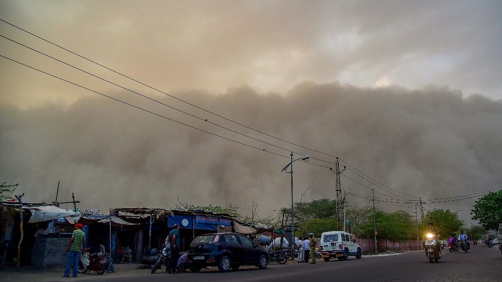 A dust storm is seen building up over the city of Bikaner on Monday, 7 May.