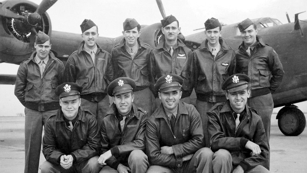 This circa 1943 US Army Air Force photo from the Kelly Family Research Project shows Lt Tom Kelly (lower right) and other members of his crew of the B-24 bomber.&nbsp;