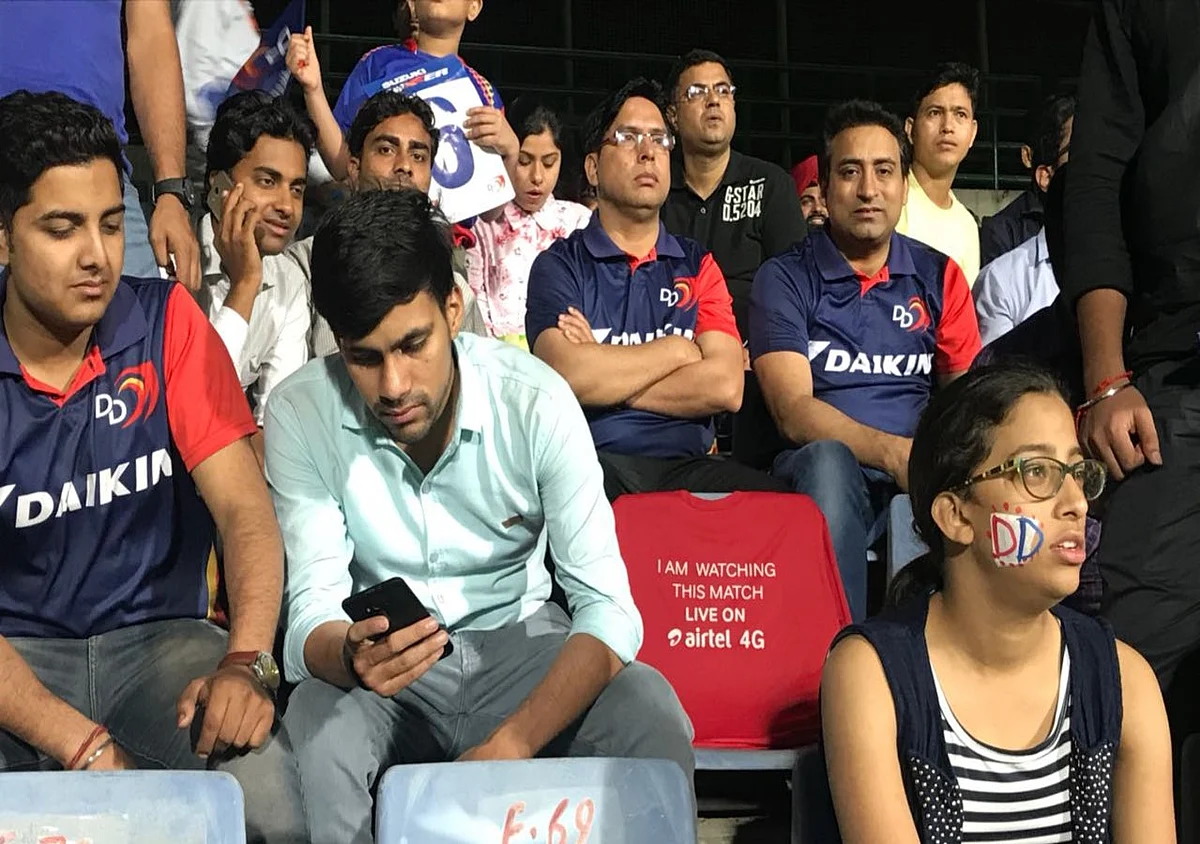 Few seats in the stadium were dressed in red-coloured t-shirts.