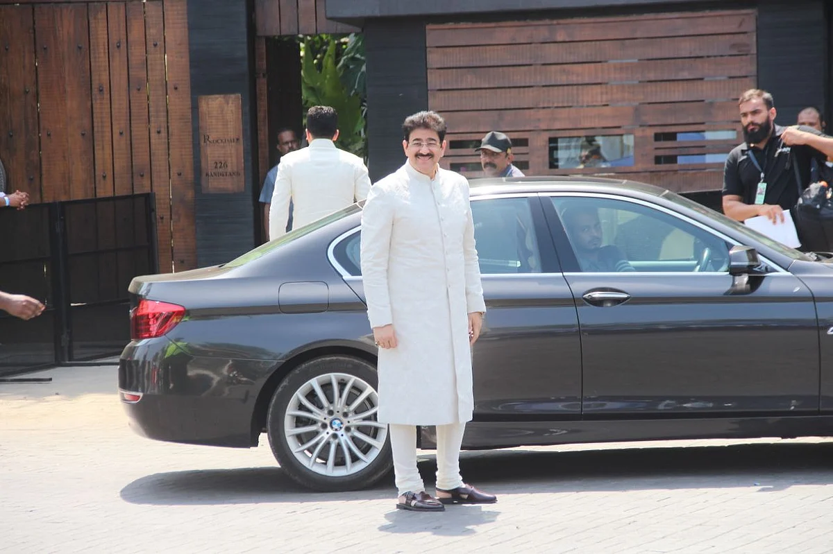 Mohit Marwah’s father Sandeep Marwah arrives for the wedding.