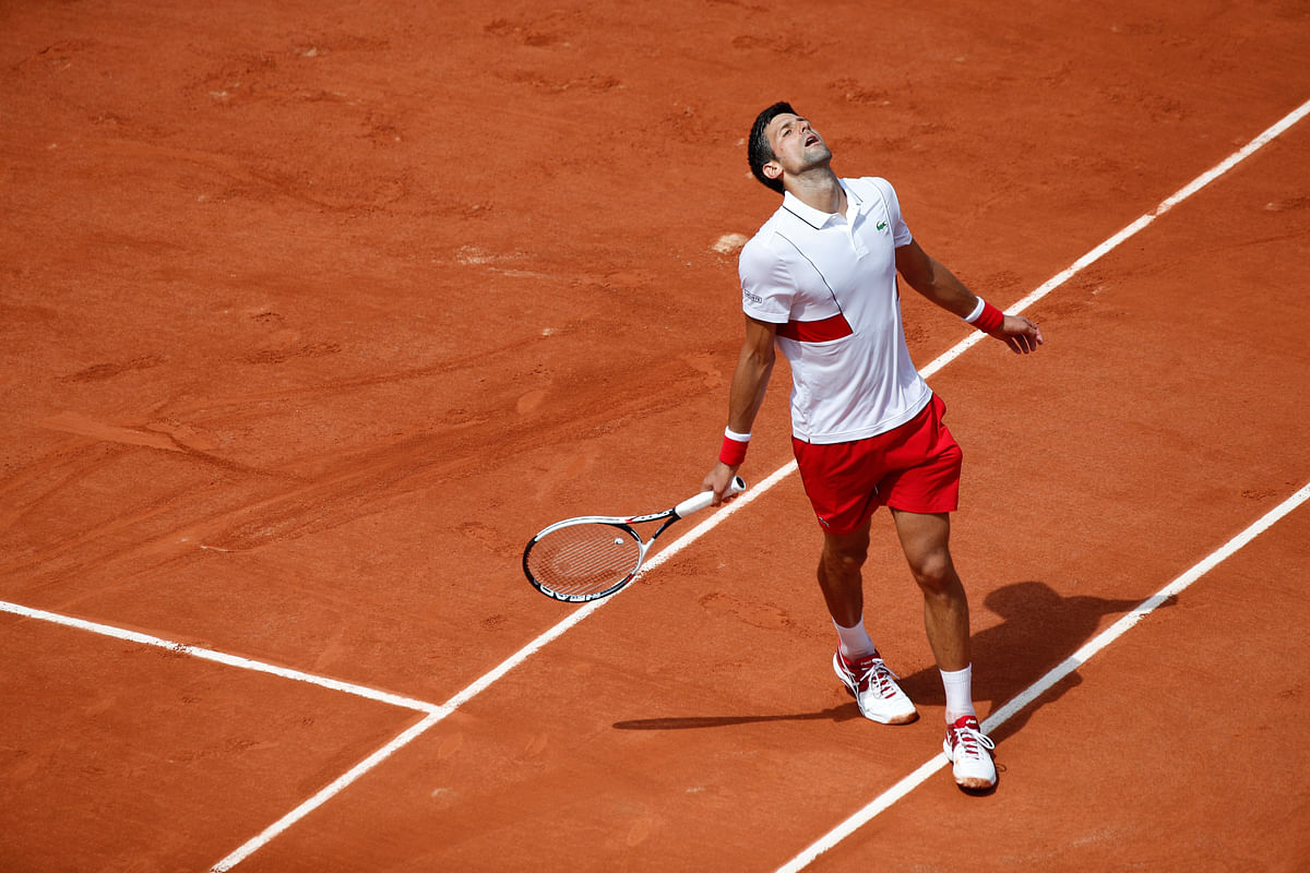 Novak Djokovic eked out a 7-6(1) 6-4 6-4 second round win over Spanish qualifier Jaume Munar at the French Open.