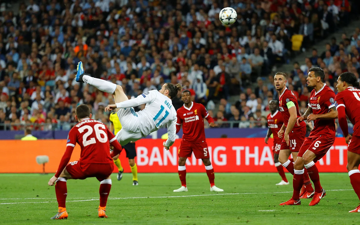 Real Madrid’s Gareth Bale scores their second goal with an overhead kick.