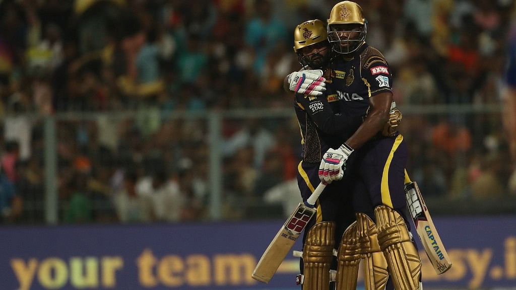 Dinesh Karthik  and Andre Russell celebrate their win against Rajasthan Royals at the Eden Gardens  in Kolkata on Tuesday.