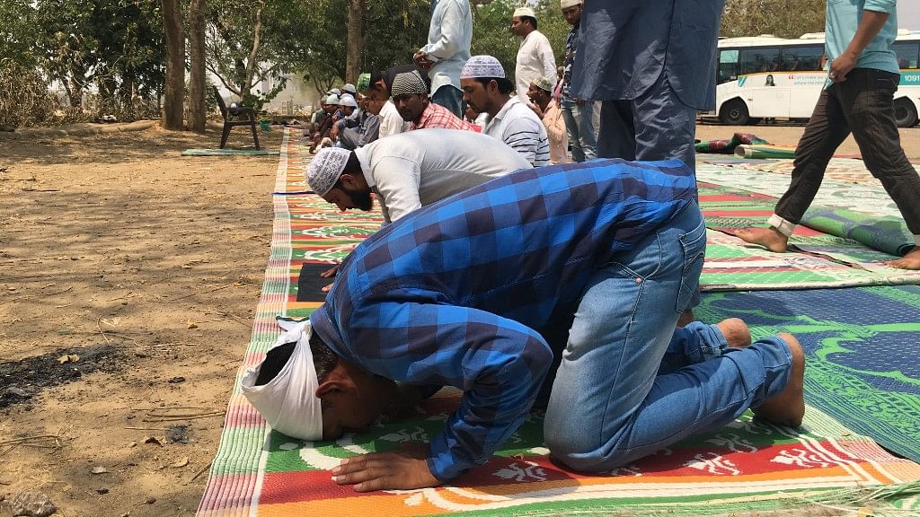 Mulsim worshipers offer prayers at one of the open places in Gurugram.  &nbsp;