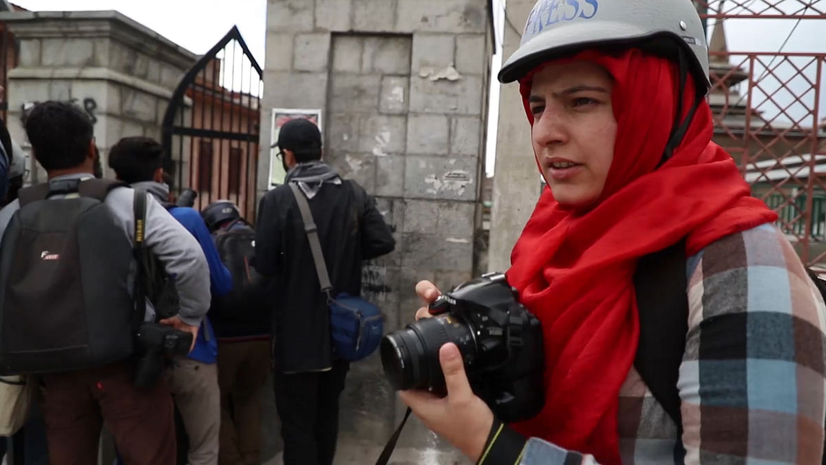 What is it like for women photojournalists who cover conflicts? 