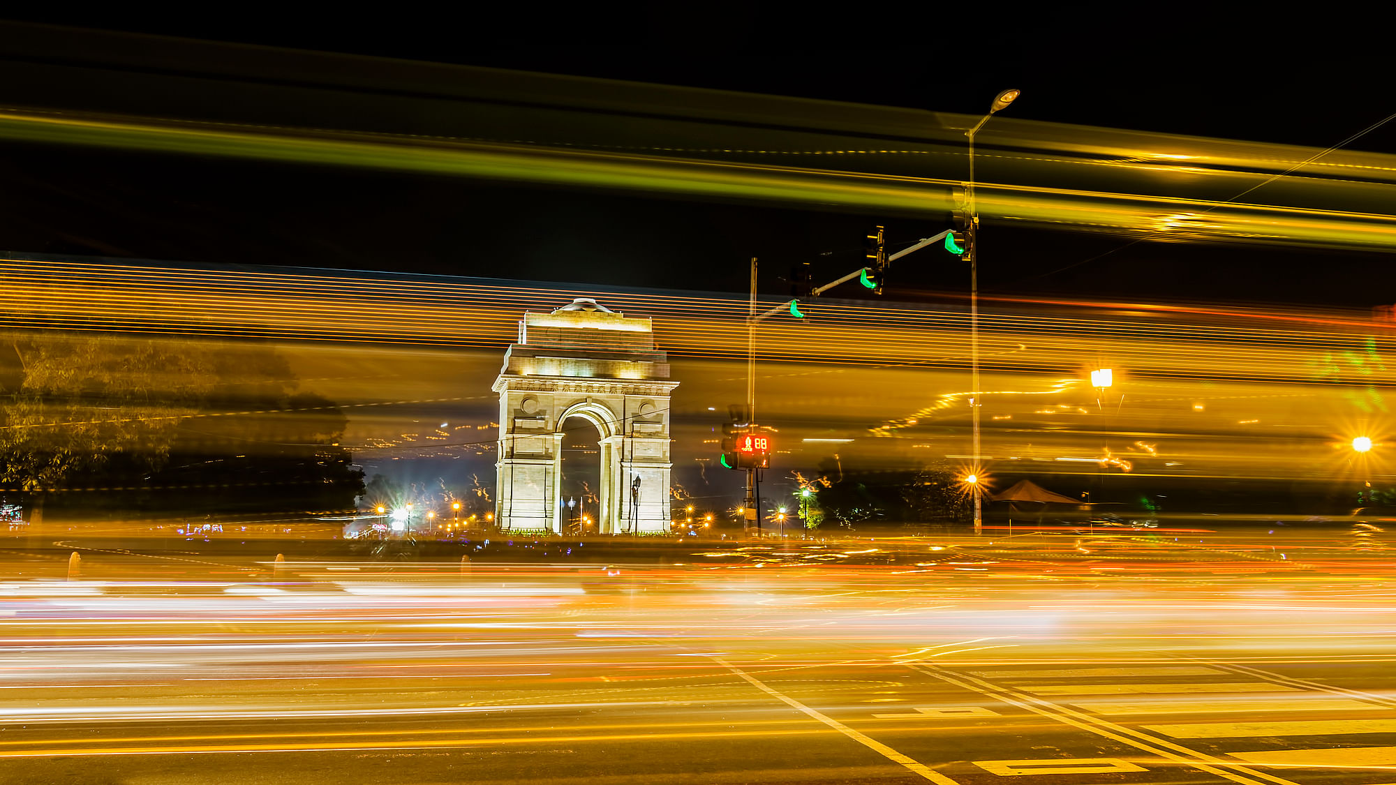 Light trails and India Gate in the background.&nbsp;