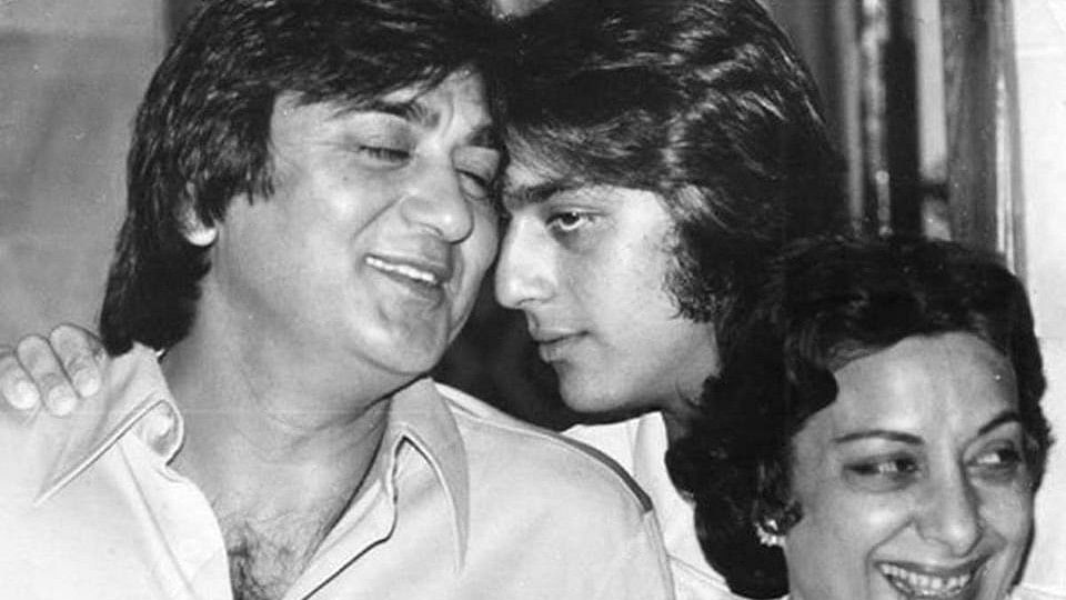 Sunil Dutt shares a moment with son Sanjay, with Nargis for company.&nbsp;
