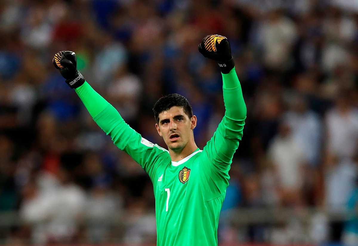 Belgium goalkeeper Thibaut Courtois celebrates at the end of the World Cup Group H qualifying soccer match between Greece and Belgium at Georgios Karaiskakis Stadium in Piraeus port, near Athens.
