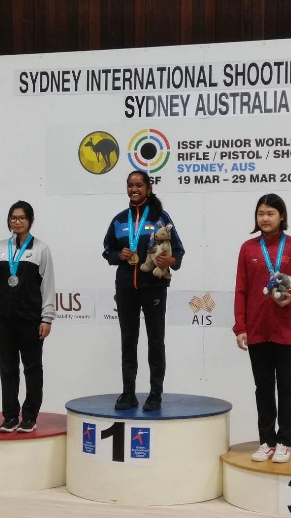 Valarivan after winning gold at in the 10M Air Rifle Shooting event.