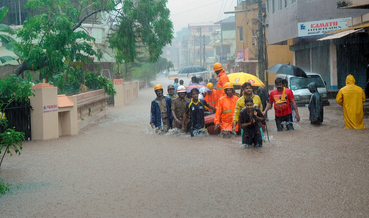 School students being led by NDRF team personnel in Mangaluru