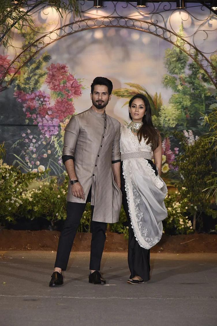 The couple wears an agreeably edge look. 