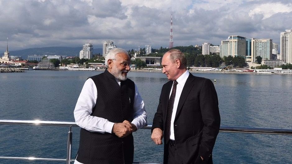 Russian President Vladimir Putin and Prime Minister Narendra Modi on a Yacht in Sochi, Russia on 21 May.