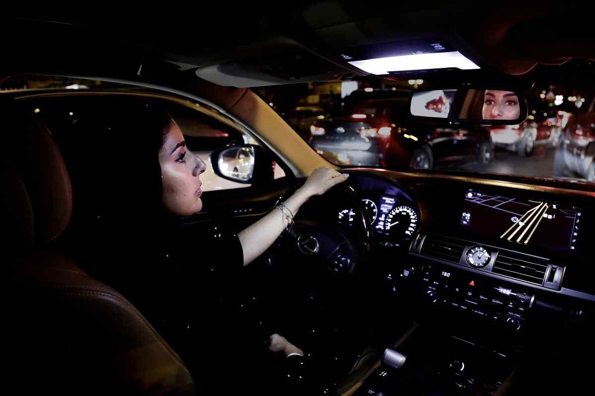 Saudi women take the wheel for the first time in the country,  minutes after the ban on women driving was lifted.