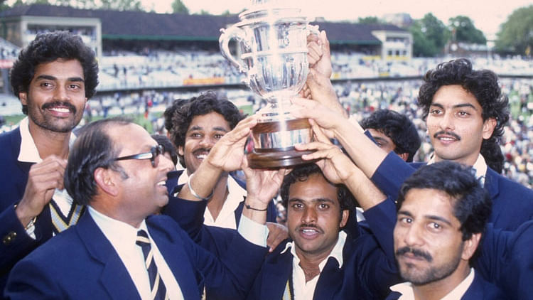 Members of the Indian cricket team with the World Cup trophy on 25 June  1983.
