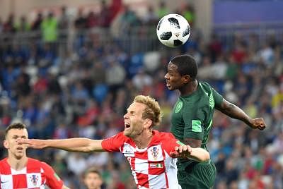 KALININGRAD, June 16, 2018 (Xinhua) -- Odion Ighalo (R) of Nigeria vies with Ivan Strinic of Croatia during a group D match between Croatia and Nigeria at the 2018 FIFA World Cup in Kaliningrad, Russia, June 16, 2018. (Xinhua/Liu Dawei/IANS)