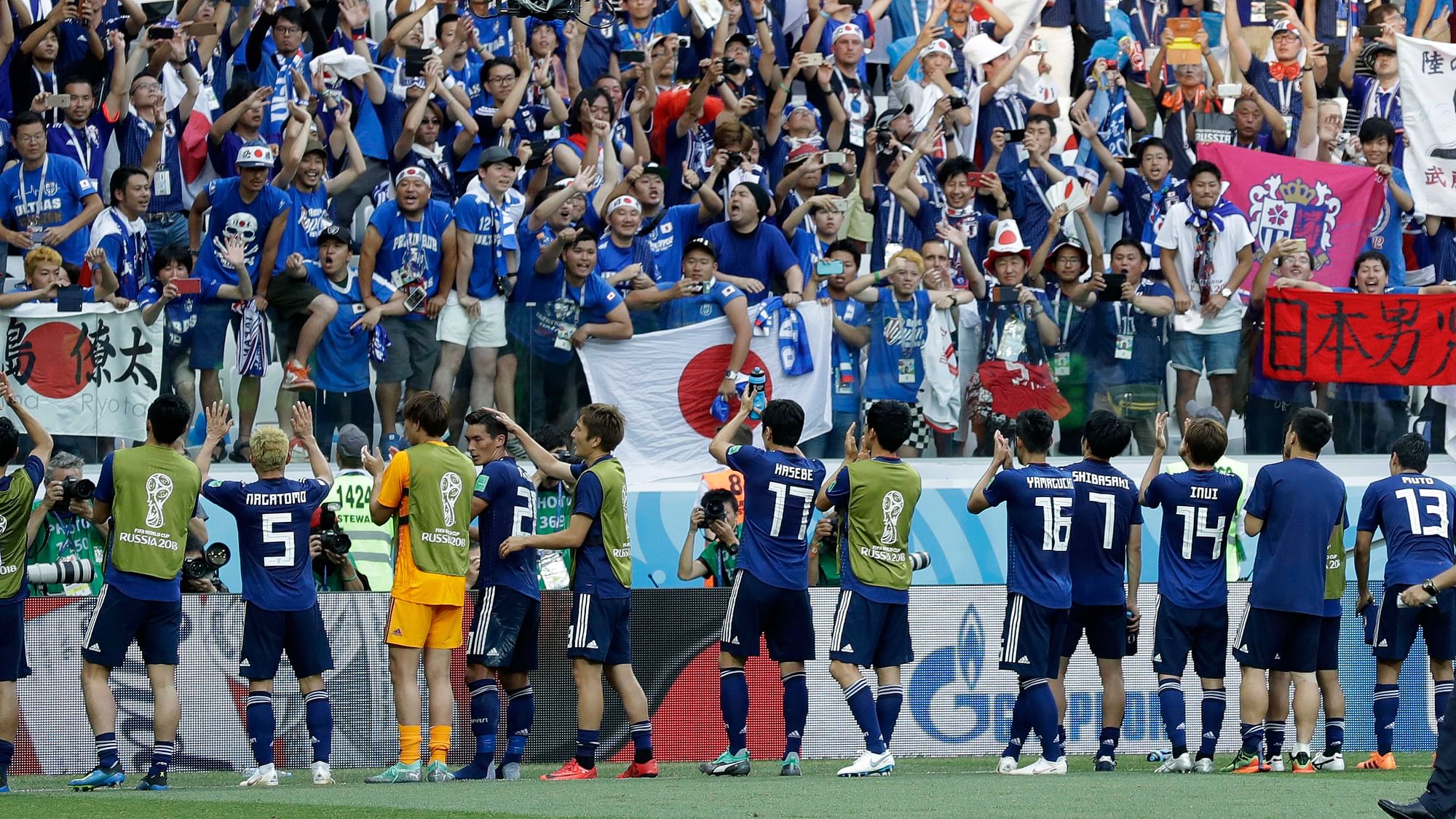 Japanese players greet their fans after the group H match between Japan and Poland at the 2018 FIFA World Cup at the Volgograd Arena in Volgograd, Russia, Thursday, June 28, 2018.&nbsp;