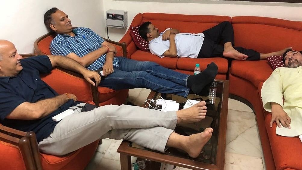 Delhi Chief Minister Arvind Kejriwal and his Cabinet colleagues spending a night at Lt Governor Anil Baijal’s office.
