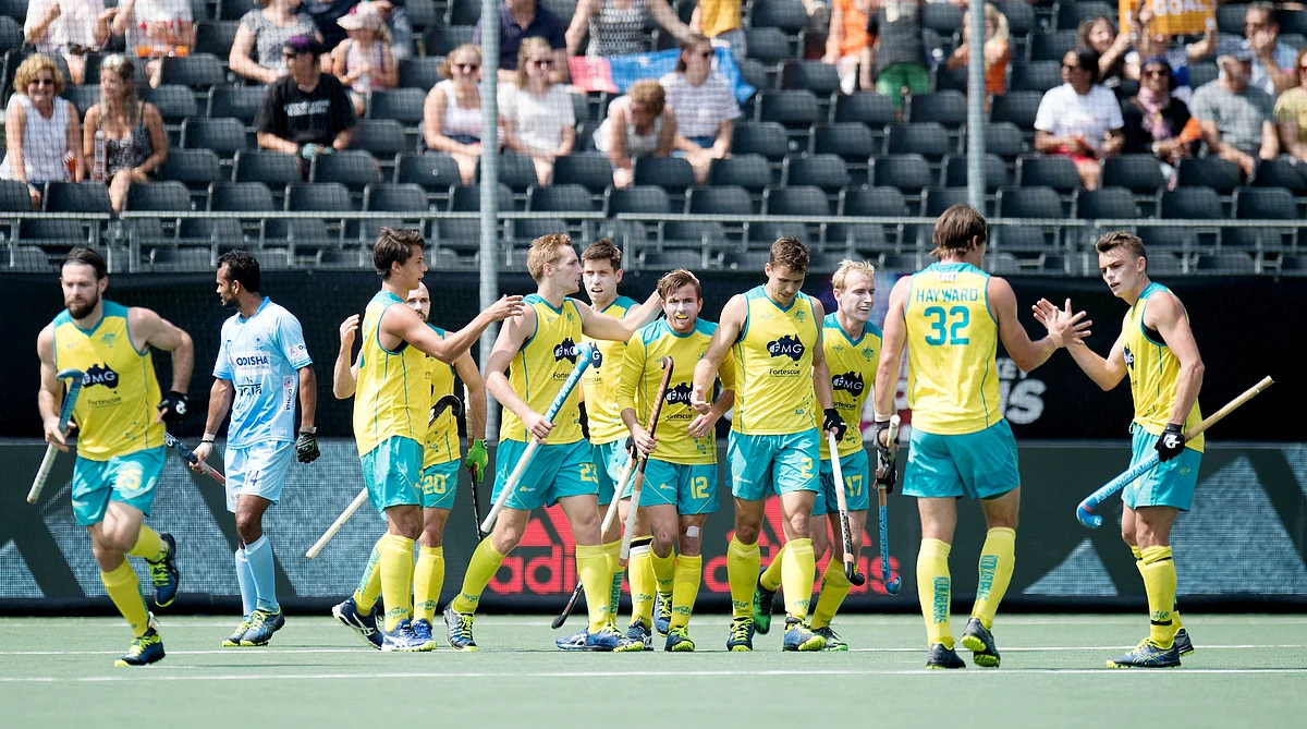The Australian team celebrate a goal.
