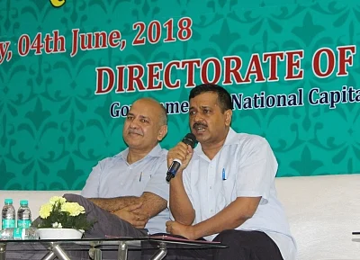 New Delhi: Delhi Chief Minister Arvind Kejriwal and Deputy Chief Minister Manish Sisodia during an interaction with the students of government school who cleared JEE Main 2018 in New Delhi, on June 4, 2018. (Photo: IANS)