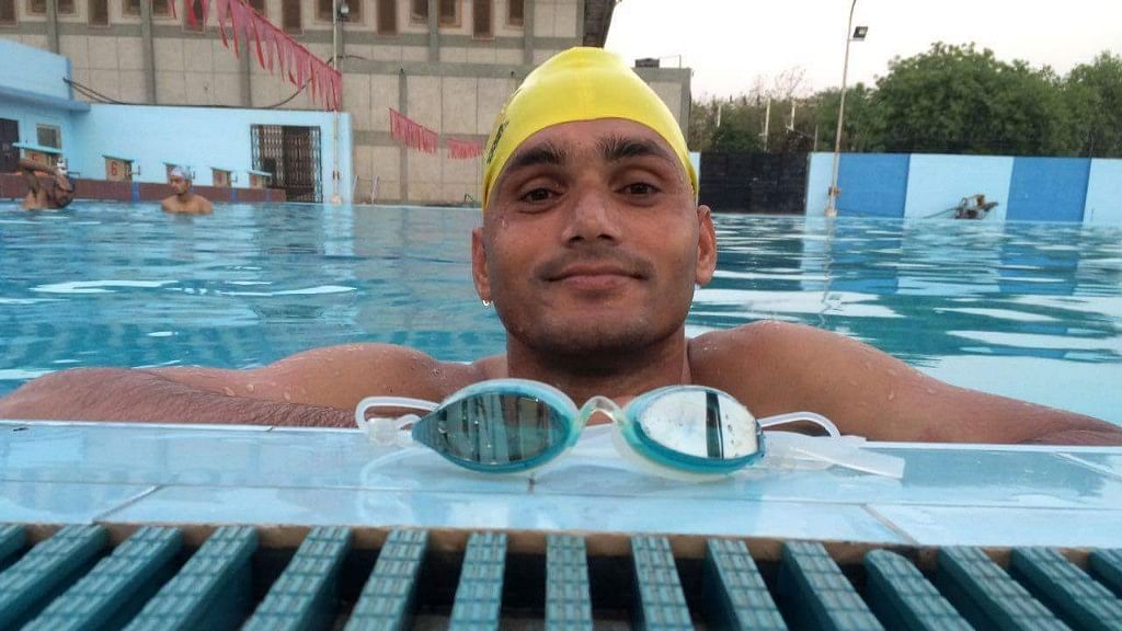 Satendra Singh in a swimming pool.
