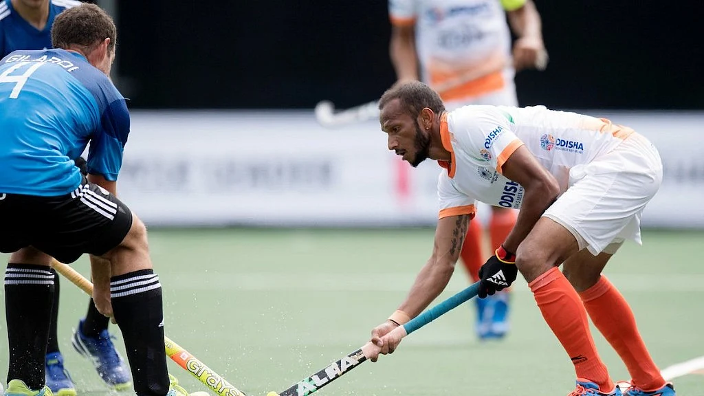 India’s SV Sunil fights for the ball with an Argentine player in the dying minutes of the match.