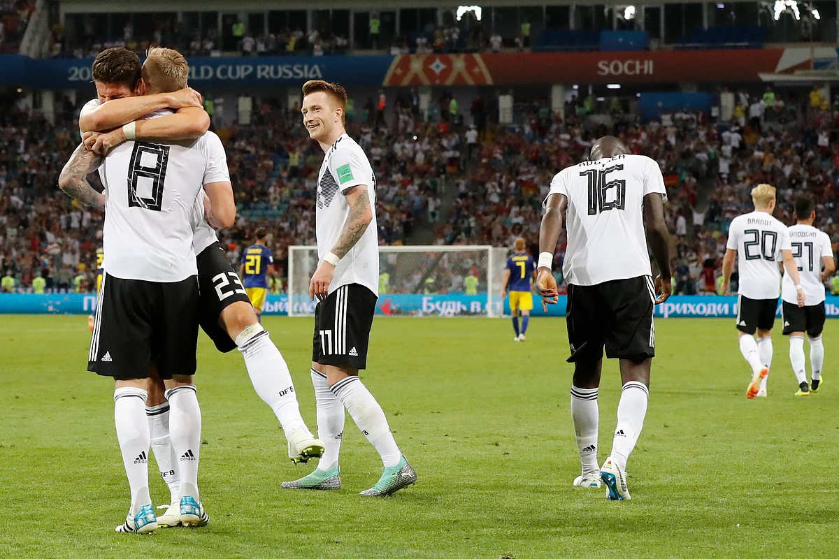Germany’s Toni Kroos, celebrates with his teammates after he scored his side’s second goal during the group F match between Germany and Sweden