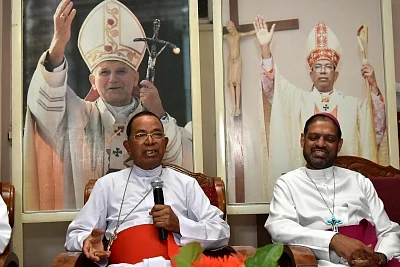 Ranchi: Cardinal Telopspore P Toppo who resigned as the Archbishop of Ranchi addresses a press conference in Ranchi on June 24, 2018. While a church source said that he was miffed over gang-rape of five tribal girls in which a priest was arrested, Catholic Bishops Conference of India General Secretary Theodore Mascarenhas (R), in a press conference said the Cardinal, who is now 87, had submitted his resignation to Pope Francis couple of years ago but it had been rejected and he had been given an
