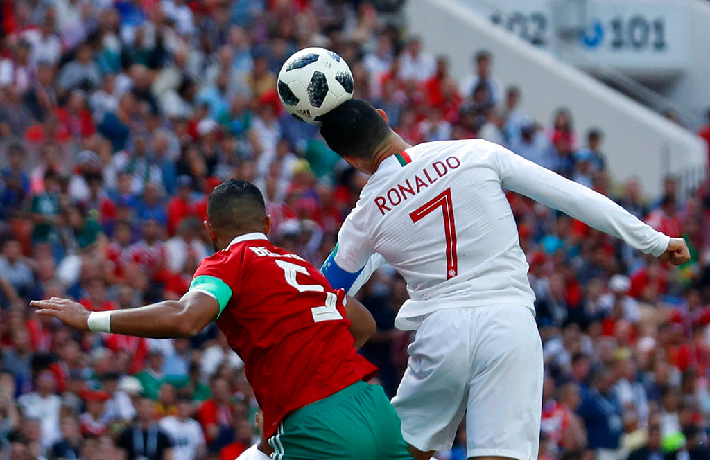Cristiano Ronaldo powered-home a fourth-minute header to help Portugal beat Morocco in a Group B match on Wednesday.