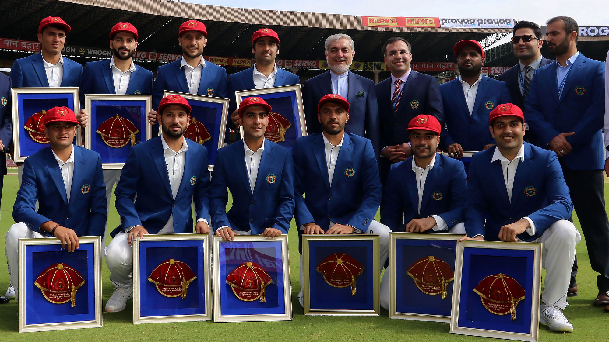 <div class="paragraphs"><p>Afghanistan pose with special caps after becoming a Test playing nation</p></div>