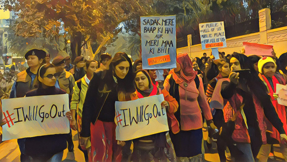 Women march holding #IWillGoOut placards. Image used for representation.