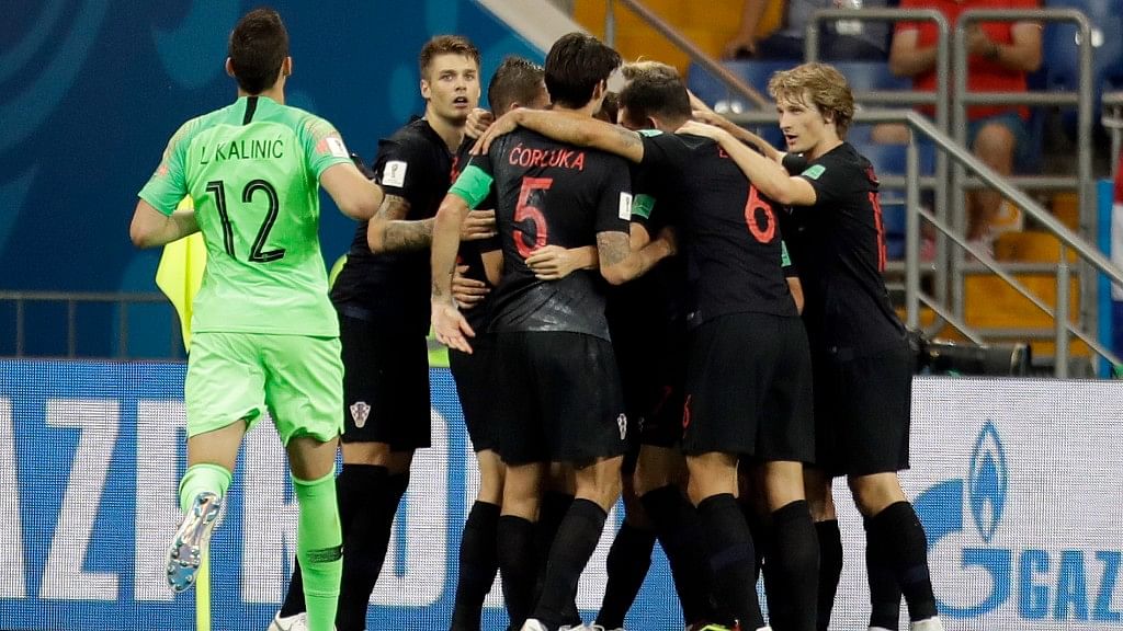 Croatia players celebrate after their teammate Ivan Perisic scored his side’s second goal during their Group D match against Iceland at the Rostov Arena in Rostov-on-Don on Tuesday.