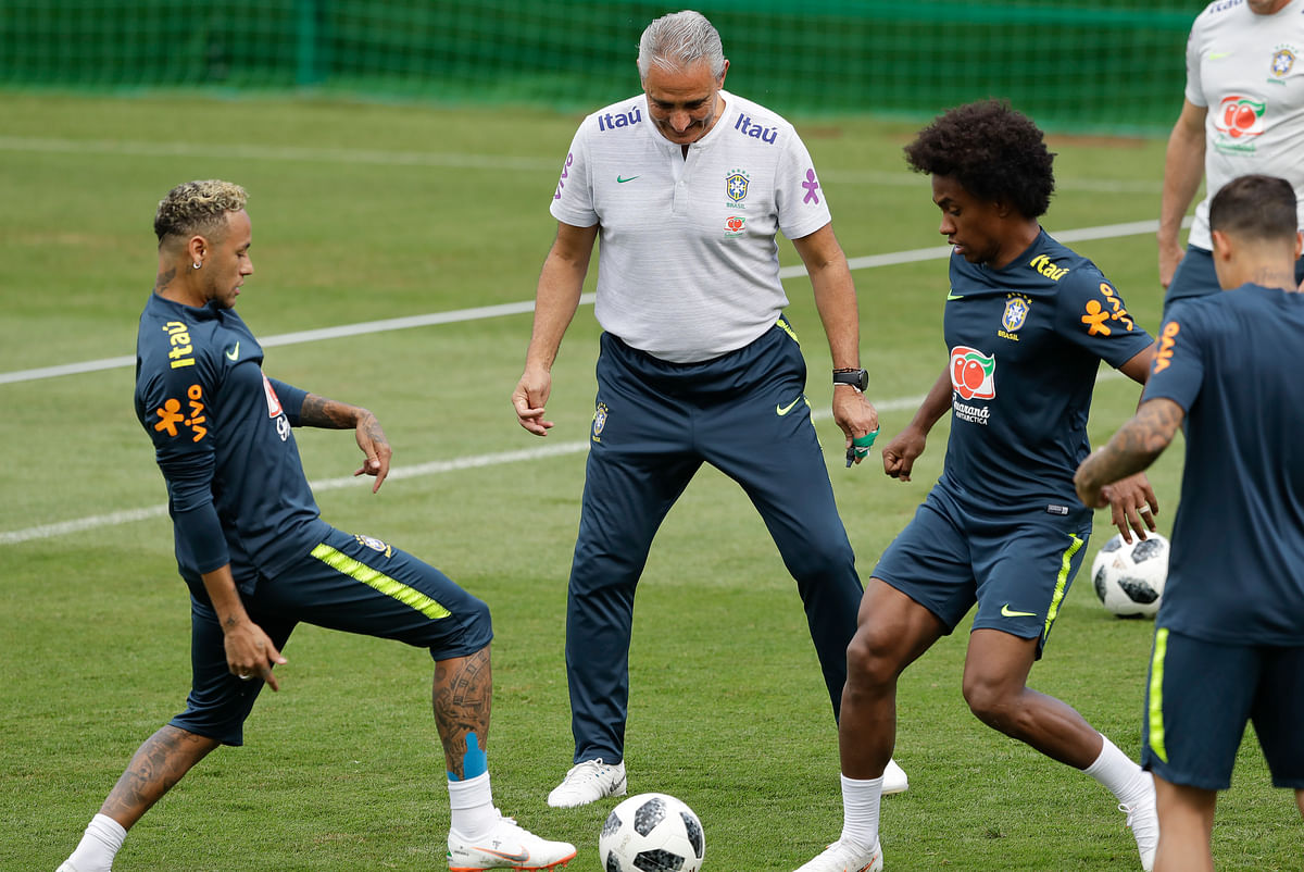 Neymar limped out of Brazil’s training session at the World Cup on Tuesday because of pain in his right ankle.
