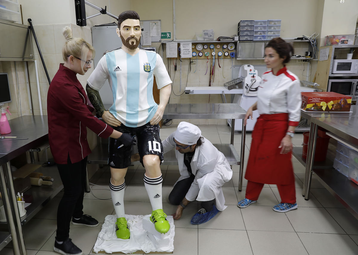Confectioners in Moscow build life-size chocolate sculpture of Messi for his birthday.
