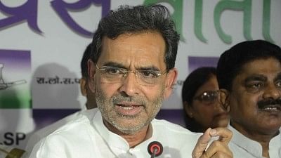 Minister of State for HRD Upendra Kushwaha addressing a press conference.