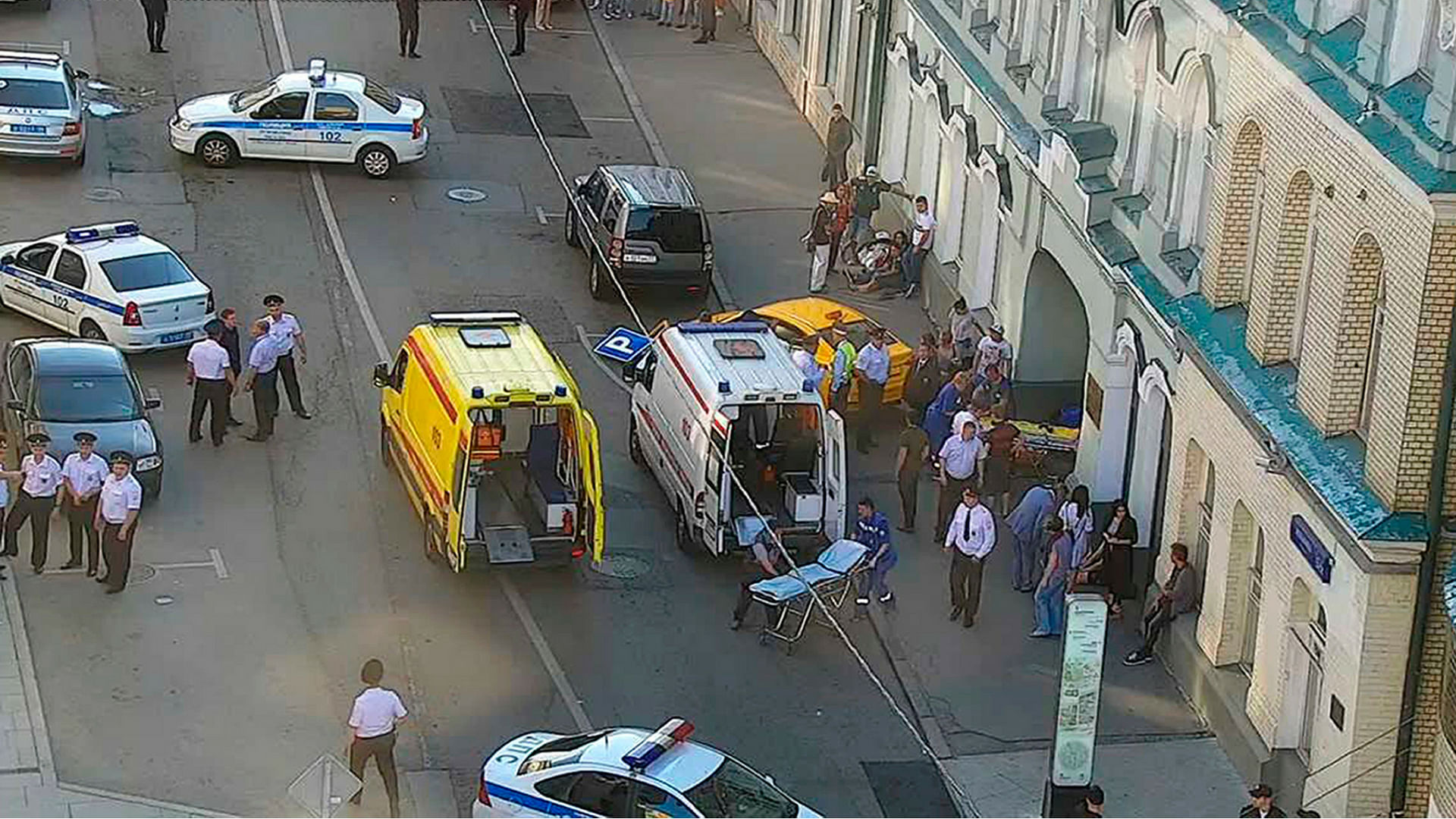 Provided by Moscow Traffic Control Center Press Service, ambulance and police work at the site of an incident involving 8 injured