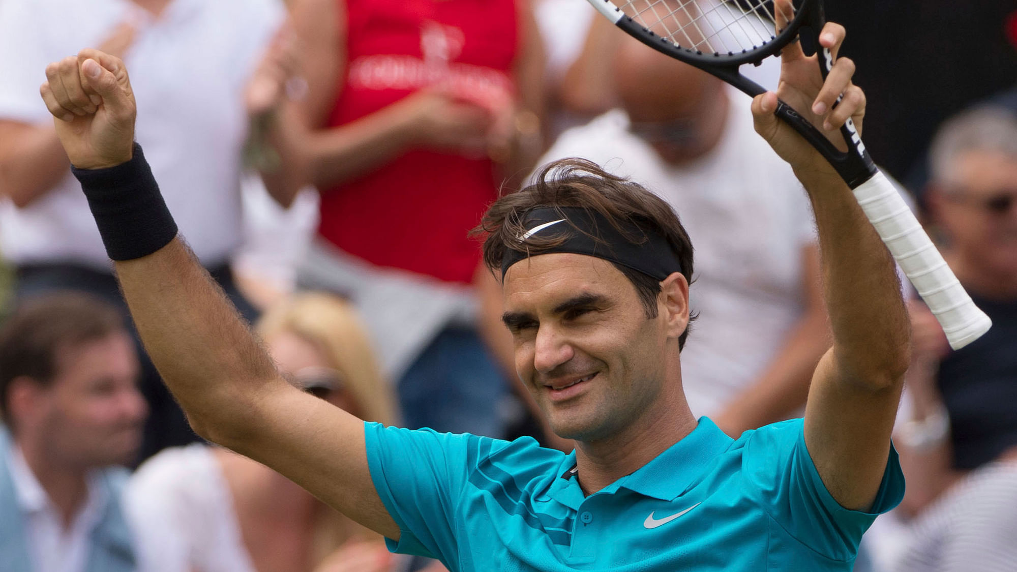Roger Federer celebrates after he beats Milos Raonic in the final tennis match of the ATP Mercedes Cup in Stuttgart.