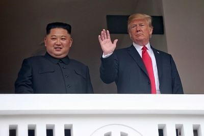 Singapore: U.S. President Donald Trump waves on the veranda of the Capella Hotel in Singapore on June 12, 2018, while having a one-on-one summit with North Korean leader Kim Jong-un in this photo provided by Singapore